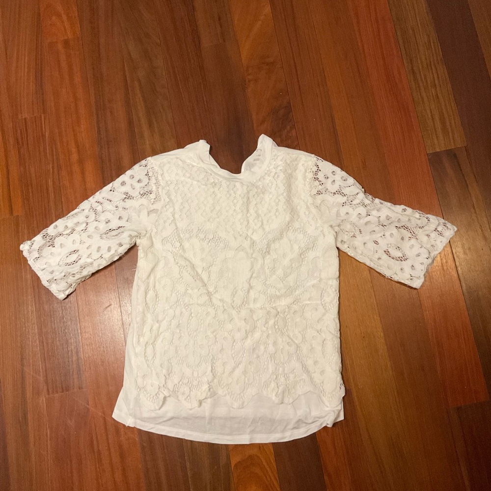 Worn twice art class lace blouse in good condition